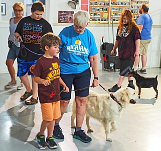 Training class with leaders, 4-h'ers, and dogs